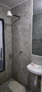 Ένα μπάνιο στο Tsavo Lifestyle One bedroom