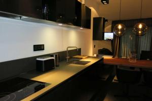 TV a/nebo společenská místnost v ubytování ON Chalet Ischgl-Mathon