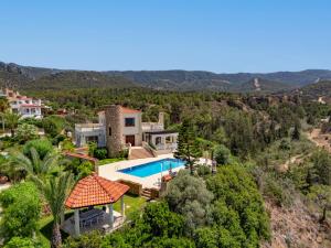 an aerial view of a villa with a swimming pool at Sunset Poseidon by Carrington in Kyrenia