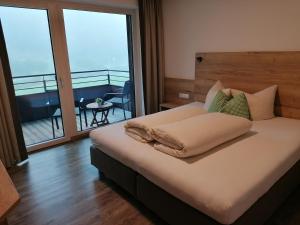 Ένα ή περισσότερα κρεβάτια σε δωμάτιο στο Apartment Lärche - DeLuxe +10 φωτογραφίες