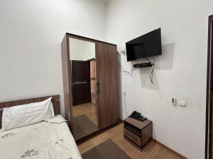 TV a/nebo společenská místnost v ubytování A-Hotel Ex Magistral