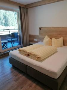 Ένα ή περισσότερα κρεβάτια σε δωμάτιο στο Apartment Tanne