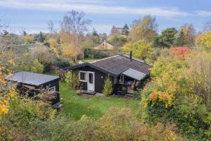 En have udenfor Cozy Holiday Home By Kelstrup Beach + 19 billeder