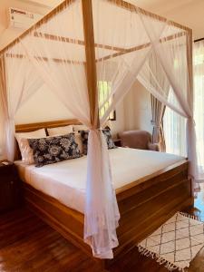 Ένα ή περισσότερα κρεβάτια σε δωμάτιο στο Well House