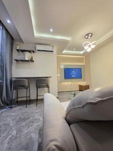 TV a/nebo společenská místnost v ubytování Furnished apartment in Macampagne