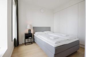 Postel nebo postele na pokoji v ubytování Elegant Apartment Lovely City Views