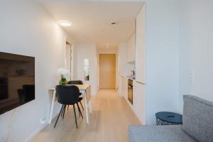 Kuchyň nebo kuchyňský kout v ubytování Elegant Apartment Lovely City Views