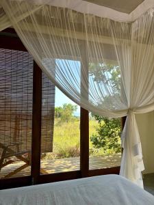 Postel nebo postele na pokoji v ubytování Casa Maiara (Eco friendly)