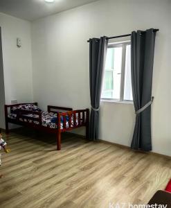 Postel nebo postele na pokoji v ubytování KAZ homestay + 1 fotografie