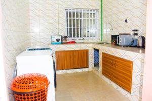 Kuchyň nebo kuchyňský kout v ubytování Résidences TODEGLA