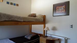 Postel nebo postele na pokoji v ubytování Maitencillo Opas Apartment