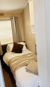 Ένα ή περισσότερα κρεβάτια σε δωμάτιο στο 105 elm walk