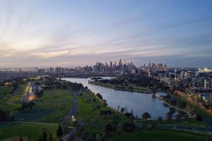 a view of a city with a river and a city at Villa Amari - A Sunny Tranquil Home in Melbourne