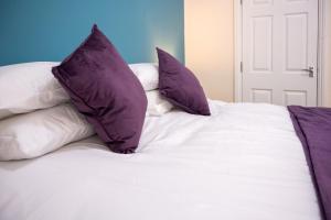 Ένα ή περισσότερα κρεβάτια σε δωμάτιο στο Rugby 1-BR Apt, Parking, City Centre, Sleeps 3