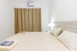 Postel nebo postele na pokoji v ubytování New building - 1 min away from the main road