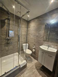 Koupelna v ubytování Hotel Café de Sport + 6 fotografií