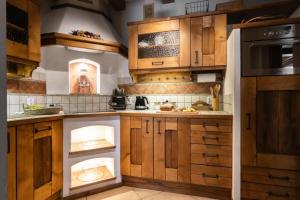 Køkken eller tekøkken på Niedźwiedzi szlak - apartament z sauną w cenie + 22 billeder