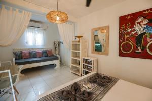 Ένα ή περισσότερα κρεβάτια σε δωμάτιο στο Sahara Sands Guest House - Gili Trawangan