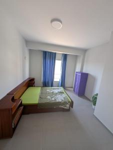 Ένα ή περισσότερα κρεβάτια σε δωμάτιο στο Vitória