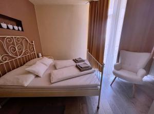 Postel nebo postele na pokoji v ubytování Aqua Apartmanok