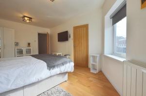 Giường trong phòng chung tại 60 Church Street