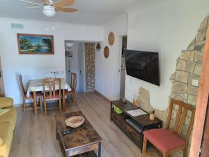 a living room with a couch and a table at Casa del Convento II Smart TV AA in Montán