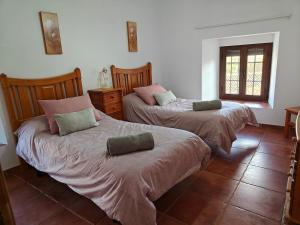 Postel nebo postele na pokoji v ubytování El Locutorio