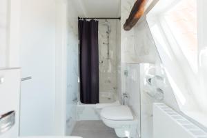 Ένα μπάνιο στο Hotel Scheffler Lüneburg +22 φωτογραφίες