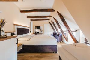 Ένα ή περισσότερα κρεβάτια σε δωμάτιο στο Hotel Scheffler Lüneburg