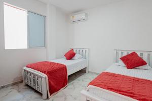 Voodi või voodid majutusasutuse Casa campestre en punta canoa Cartagena toas +40 fotot