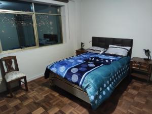 En eller flere senge i et værelse på Departamento céntrico