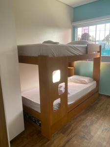 Postel nebo postele na pokoji v ubytování Residencial Luce Del Sole - Casa Nº 5