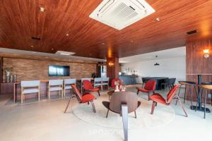 Χώρος καθιστικού στο Prédio à beira-mar c/ Piscina e academia - ARUs