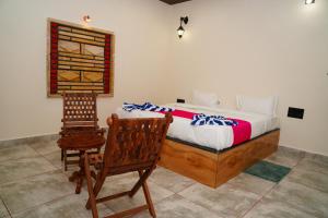 Postel nebo postele na pokoji v ubytování Kesar Villa Resort