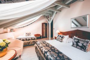 Ένα ή περισσότερα κρεβάτια σε δωμάτιο στο Carlton +31 φωτογραφίες