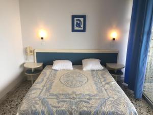 Postel nebo postele na pokoji v ubytování Hotel la Parata