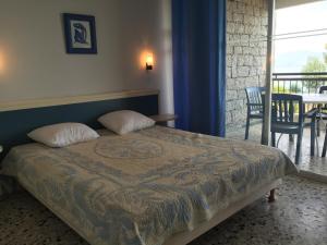 Postel nebo postele na pokoji v ubytování Hotel la Parata
