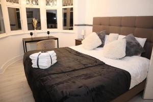 Ένα ή περισσότερα κρεβάτια σε δωμάτιο στο The Hidden Gem