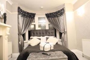 Ένα ή περισσότερα κρεβάτια σε δωμάτιο στο The Hidden Gem +11 φωτογραφίες