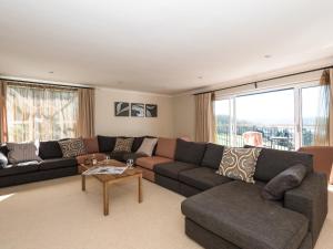 a living room with a couch and a table at North Dean in Winster