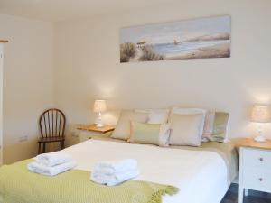 Postel nebo postele na pokoji v ubytování Lili Wen + 7 fotografií