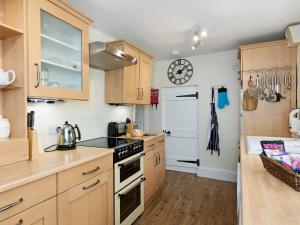 Kuchyň nebo kuchyňský kout v ubytování Church Cottage