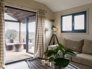 Χώρος καθιστικού στο Holders Cottage