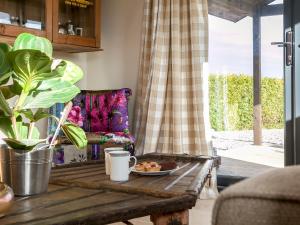 Χώρος καθιστικού στο Holders Cottage