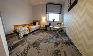 Postel nebo postele na pokoji v ubytování Cynamon