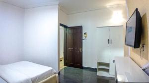 Μια τηλεόραση ή/και κέντρο ψυχαγωγίας στο Kings Apartment Ikeja