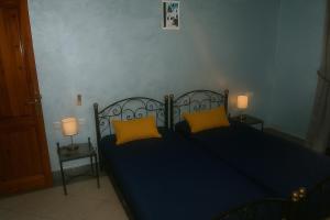 Giường trong phòng chung tại Villa près de marrakech vue sur l'atlas +30 ảnh