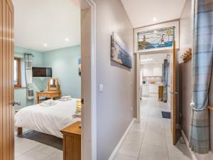 Postel nebo postele na pokoji v ubytování Primrose Cottage + 12 fotografií