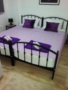 Ένα ή περισσότερα κρεβάτια σε δωμάτιο στο Apartments EDEN