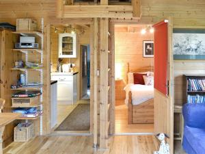 Ένα ή περισσότερα κρεβάτια σε δωμάτιο στο Forest Lodge